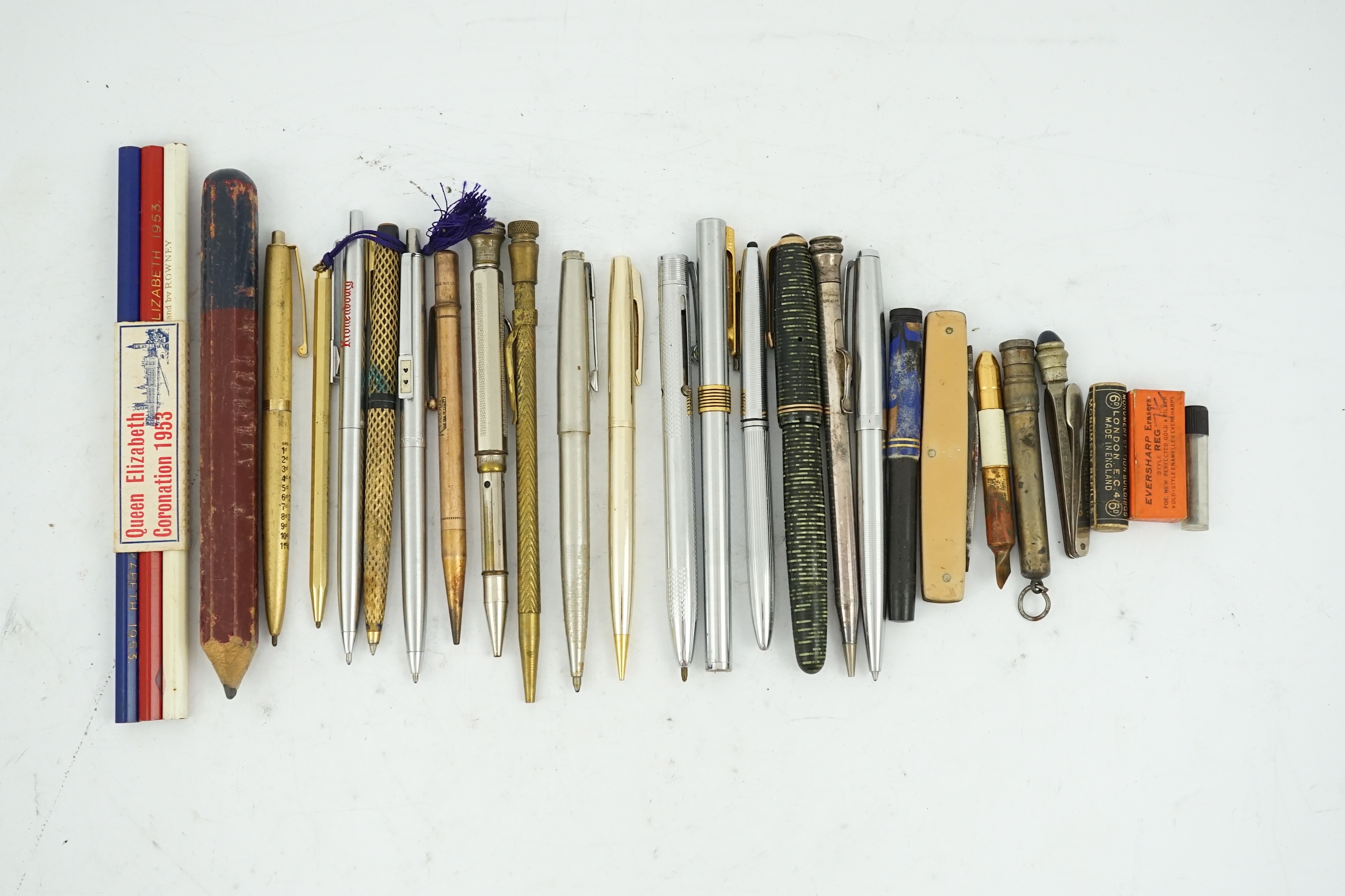 A collection of pens, pencils and stationery equipment, including a Parker Vacumatic